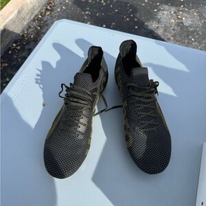 Umbro Black and Yellow Cleats